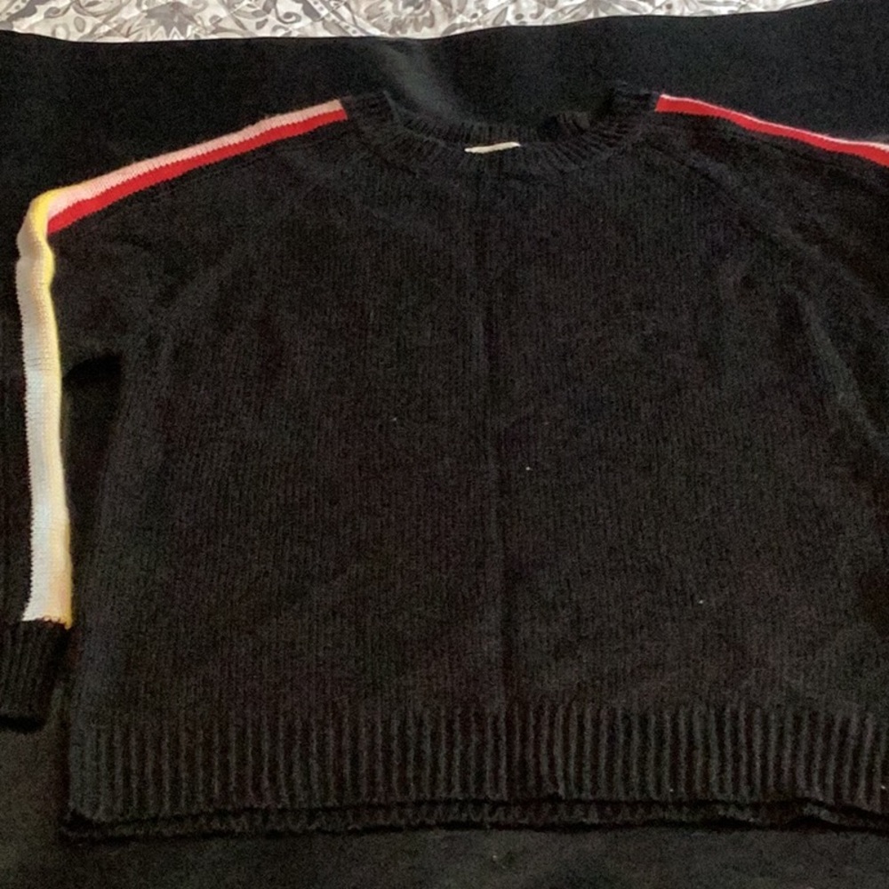 Womens Black Sweater with Red and Yellow Stripes.
